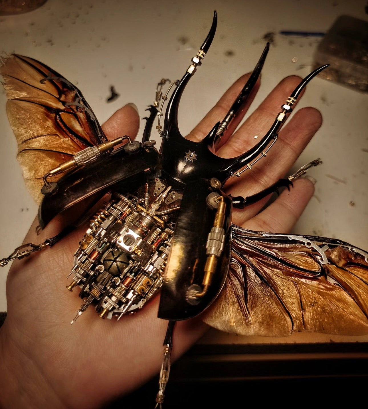 Massive framed three-horned Atlas Beetle (Chalcosoma) specimen in a premium dark wood frame. Cover image for the Rare Masterpieces collection featuring exclusive, giant, and collector-grade insect taxidermy art.